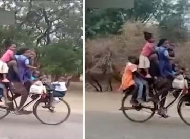 ایک شخص کی 9 بچوں کے ساتھ سائیکل چلانے کی ویڈیو وائرل
